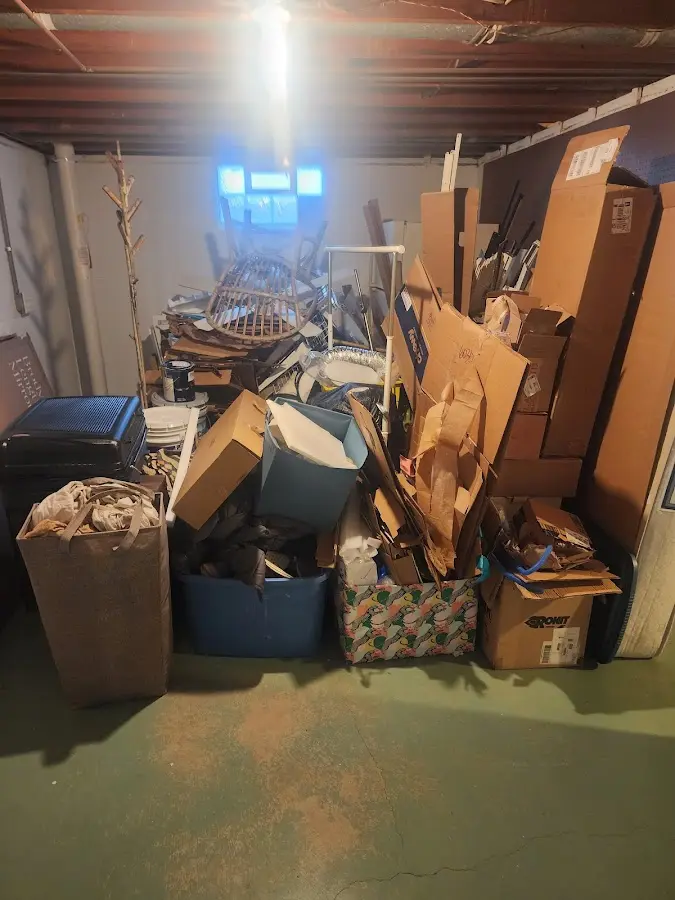 Roll-off dumpster container at job site for Construction Dumpster Rental in Bowling Green